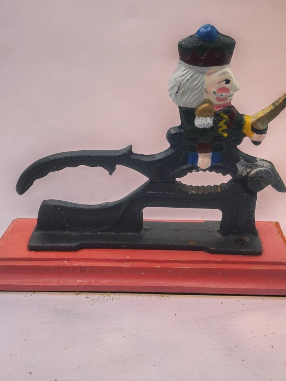 vintage cast iron colonial soldier wooden base nut cracker